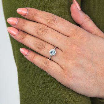 9ct White Gold 0.75ct Aquamarine and 1/10 Carat Diamond Halo Ring