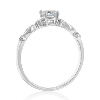 9ct White Gold Round Cut 0.45ct Aquamarine and Diamond Ring