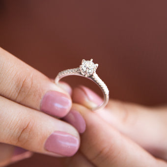 18ct White Gold 0.60 Carat Solitaire with 1/2 Carat Certified Centre Diamond