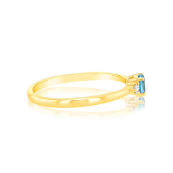 0.30 Carat Blue Topaz and Diamond Ring in 9ct Yellow Gold