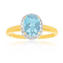 Load image into Gallery viewer, 9ct Yellow Gold Blue Topaz 6x8mm and Diamond Halo Ring