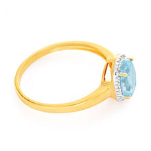 Load image into Gallery viewer, 9ct Yellow Gold Blue Topaz 6x8mm and Diamond Halo Ring