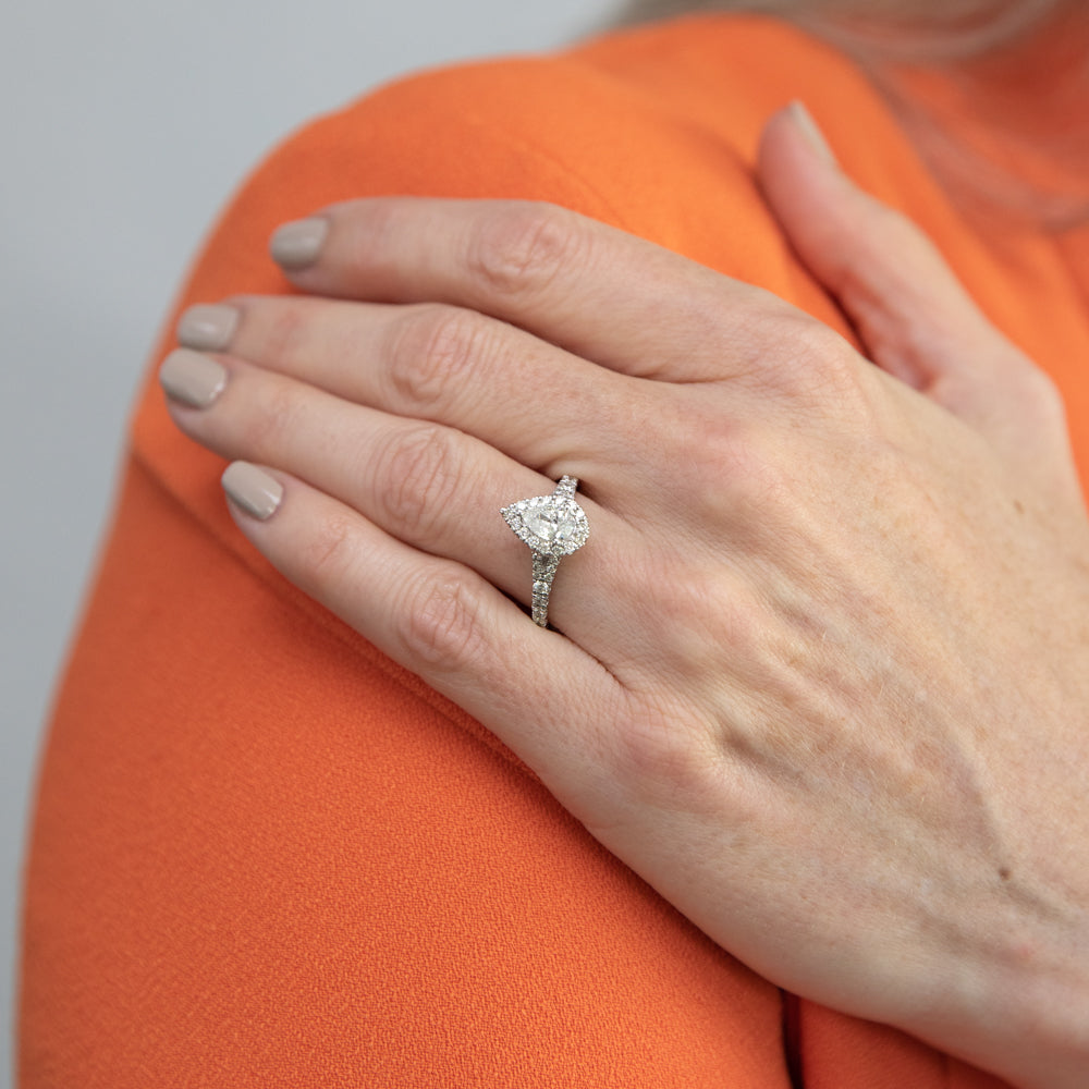 9ct White Gold 1 Carat Pear Cut Diamond Solitaire Ring with Brilliant Halo and Sides