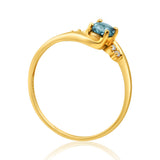 9ct Yellow Gold Blue Topaz + 4 Cubic Zirconia Ring