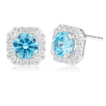 Load image into Gallery viewer, Sterling Silver Rhodium Plated Light Blue Zirconia Round Cut Halo Stud Earrings