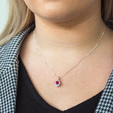Sterling Silver Created Ruby and Zirconia Oval Pendant
