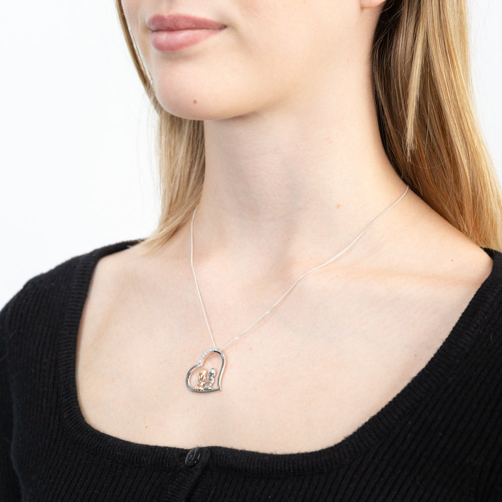 Sterling Silver And Rose Gold Plated Cubic Zirconia Engraved Heart Sister Pendant