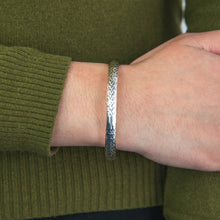 Load image into Gallery viewer, Sterling Silver Textured 7mm Hinged With Saftey Chain Bangle