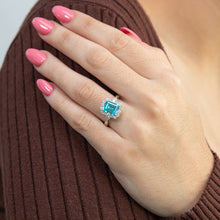 Load image into Gallery viewer, Sterling Silver Rhodium Plated White &amp; Aquamarine Cubic Zirconia Emerald Cut Ring