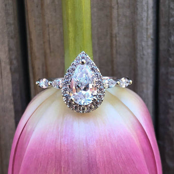 Sterling Silver Rhodium Plated Cubic Zirconia Pear Halo Ring with Marquise Band
