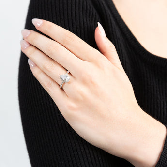 Sterling Silver Rhodium Plated Cubic Zirconia Pear Halo Ring with Marquise Band